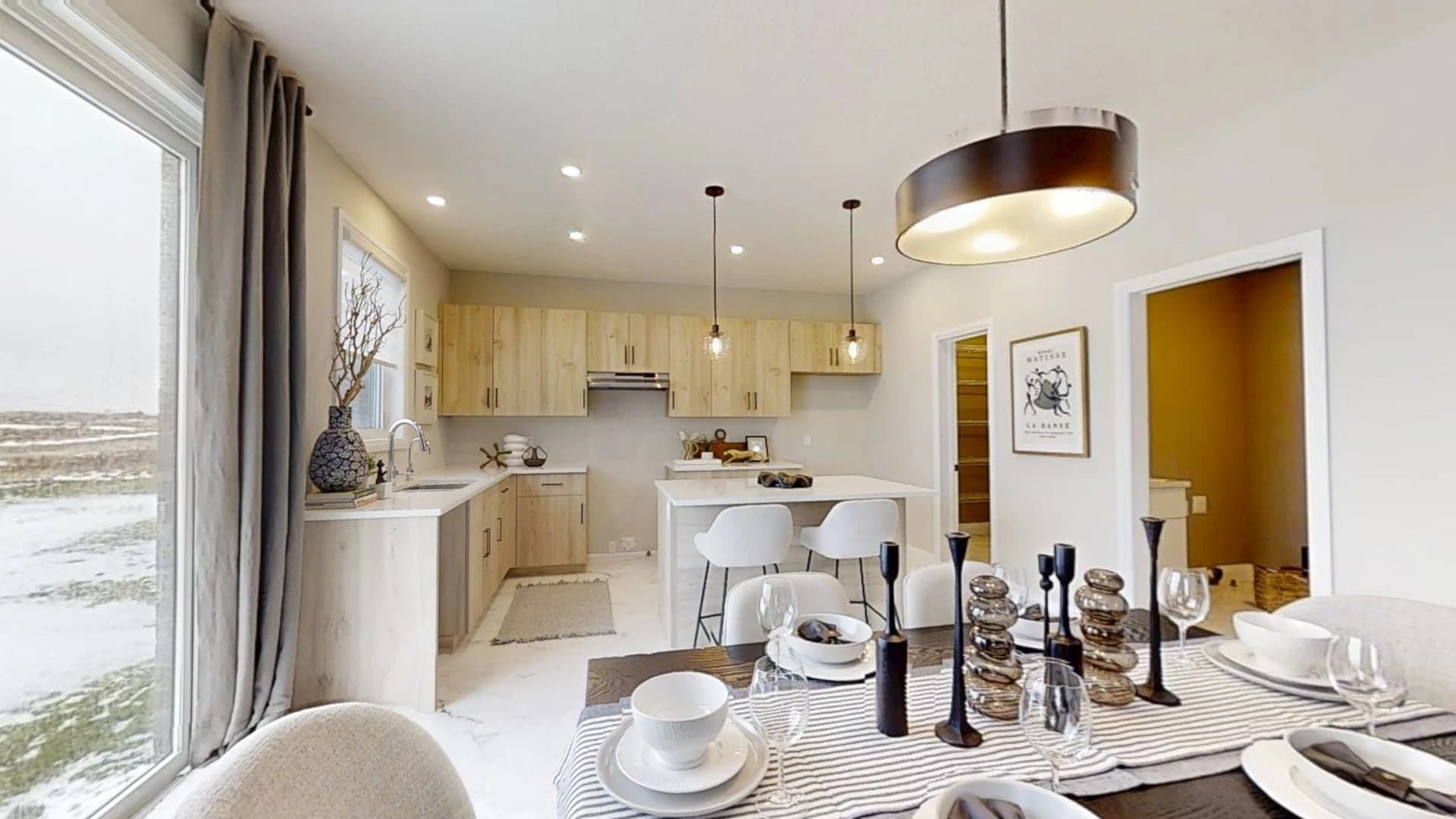 The Willow model home's dining room and kitchen, photographed in its published virtual tour